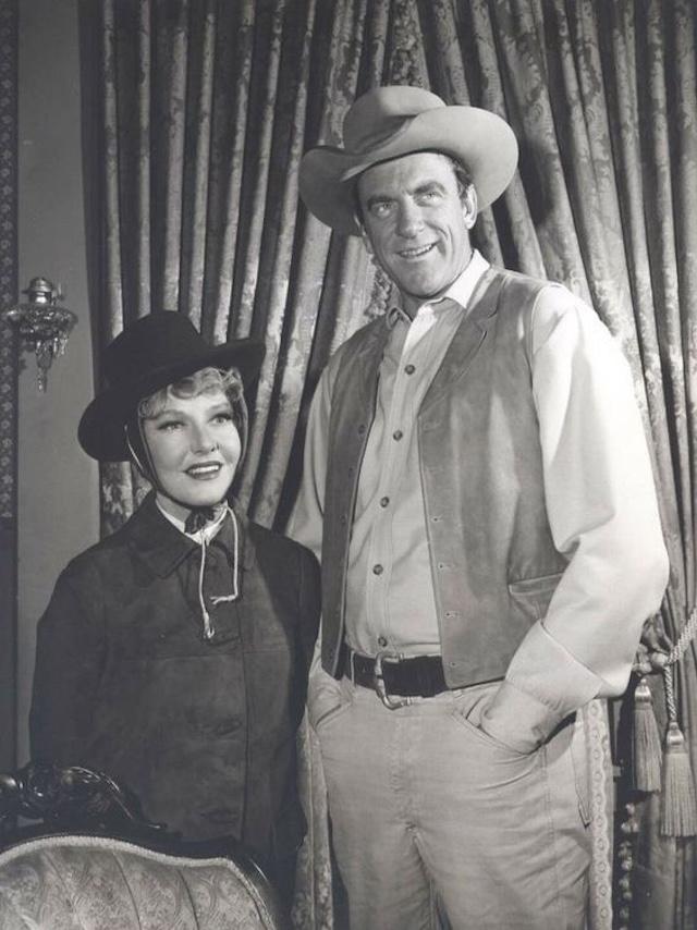 James Arness and Amanda Blake on the set of Gunsmoke. The duo brought the characters of Matt Dillon and Miss Kitty to life, becoming one of TV’s most iconic pairs in this classic Western.