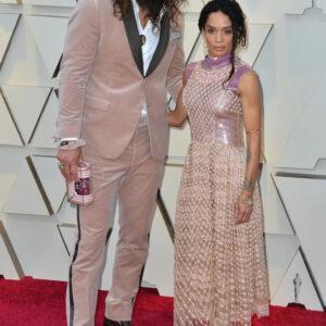 Jason Momoa and Lisa Bonet together at a past award show, showcasing their iconic red carpet style.
